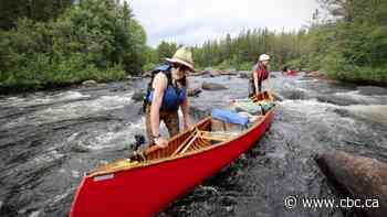 New documentary traces Alberta filmmaker's 'comical' canoe trip with 70-year-old dad