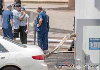 Vehicle crashes through building, kills 3