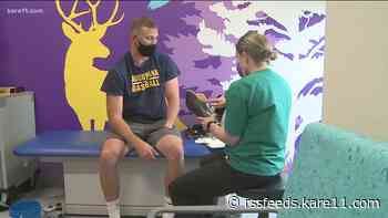 College pitcher gets fitted for new prosthetic arm after having his stolen
