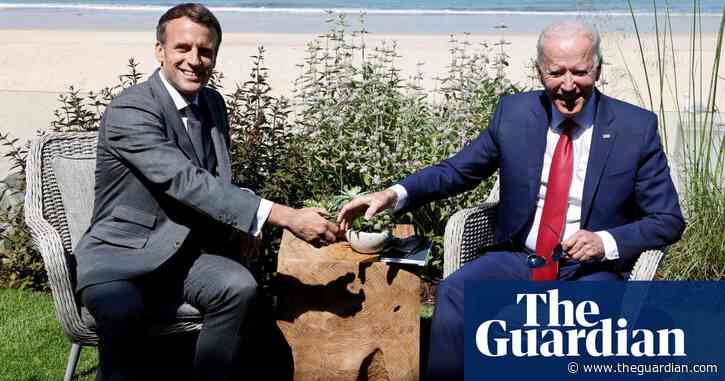 'America is back': Biden gets thumbs up from Macron at G7 – video