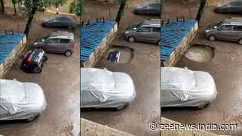 Car drowns in sinkhole after heavy rains lash Mumbai - Watch