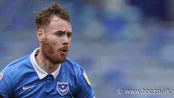 Tom Naylor: Wigan Athletic sign Portsmouth captain on three-year deal