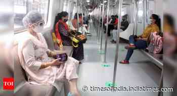 Coronavirus live updates: Delhi Metro to continue with 50% seating norms, no standing riders - Times of India
