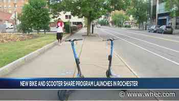 Community members enjoying new bike and scooter share program in Rochester