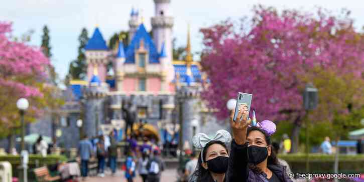 Disneyland is ditching mask requirements for fully vaccinated guests on Tuesday and will rely on customers to 'self-determine distancing' at the California park