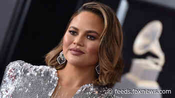 Chrissy Teigen reveals new ink honoring daughter's pre-school graduation in first post after apology