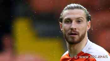 James Husband: Blackpool defender signs new two-year contract