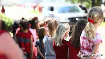 Saskatchewan town lines the streets to honour fallen RCMP officer