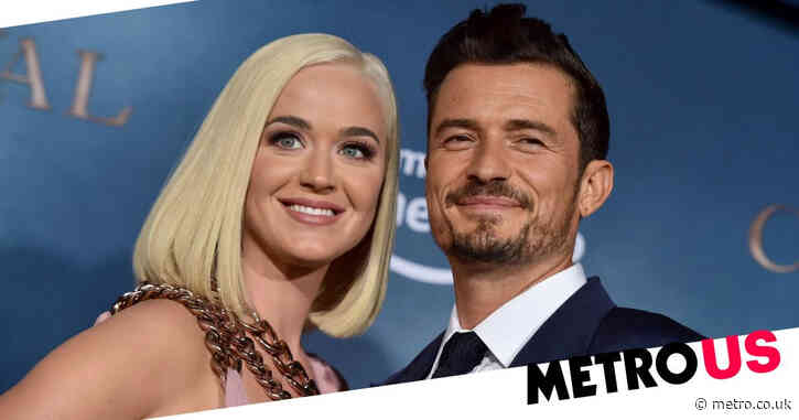 Katy Perry and Orlando Bloom kiss and cuddle during romantic gondola ride around Venice