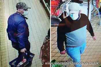 Police release images of two men following theft from elderly shopper in Aldi store