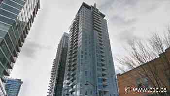 Falling paving stones pelt vehicles as gusting winds blow them off Calgary highrise balcony