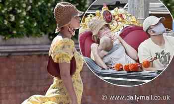 Katy Perry suffers a Marilyn Monroe moment as her dress flutters in the breeze while out in Venice