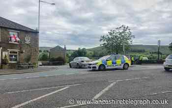 Road closed following incident off Grane Road
