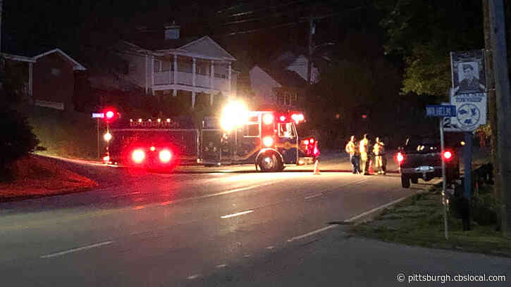 Driver Crashes Into Pole On Brownsville Road, Bringing The Pole Down Onto The Vehicle