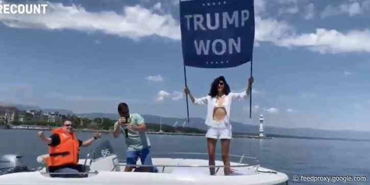 Video shows Osama bin Laden's niece waving a flag saying 'Trump won' on a lake outside the Biden-Putin summit