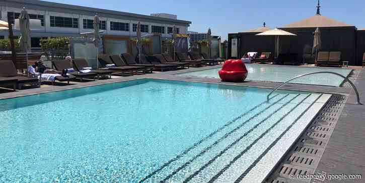 I used ResortPass to book affordable poolside day-cations at luxury hotels - here's why I'll be using it all summer