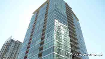 Several vehicles damaged after paving stones fall from Calgary residential tower - CTV Toronto