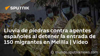 Lluvia de piedras contra agentes españoles al detener la entrada de 150 migrantes en Melilla | Vídeo - Sputnik Mundo