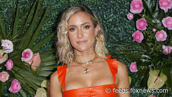 Kristin Cavallari sizzles in white bikini as she enjoys a beach day