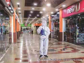 Covid-19 pandemic: Consumers unwilling to visit malls, says survey - Business Standard