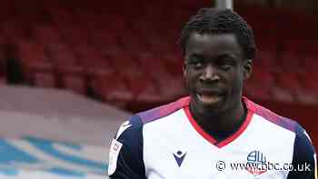 Arthur Gnahoua: Morecambe sign winger following his release by Bolton Wanderers