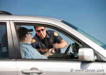Don't hand your beer to a cop during a traffic stop