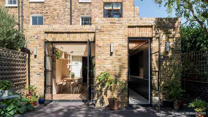Vaulted roof lights direct daylight into plywood-lined extension by Bradley Van Der Straeten