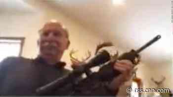 Michigan AG will not charge county commissioner who displayed a gun during a virtual meeting