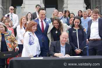 Polis signs 'Colorado Option' health insurance bill into law on Capitol steps - Vail Daily News