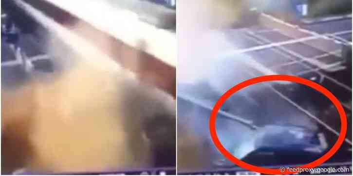 Dramatic CCTV footage shows the moment a stolen car crashes into a high-speed train