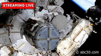 Spacewalking astronauts tackle solar panel work