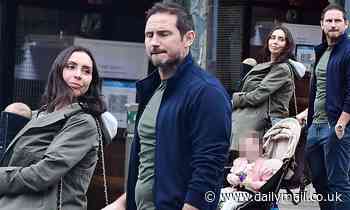 Christine Lampard and her husband Frank enjoy a dog walk in London with their two children