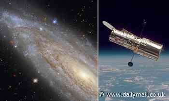 Hubble Telescope takes picture of galaxy with a core that gives off as much energy as the rest of it