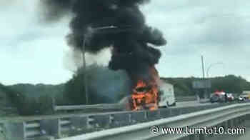 Fire, smoke pour from camper along Rhode Island highway - Turn to 10