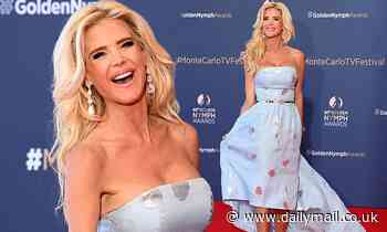 Victoria Silvstedt puts on busty display in baby blue floral dress at Monte Carlo TV Festival