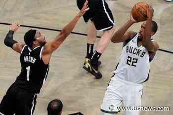 AP Source: Middleton, Holiday, Love Commit to Tokyo Games