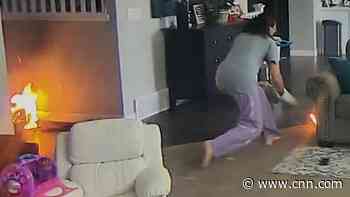 Footage shows hoverboard burst into flames in home