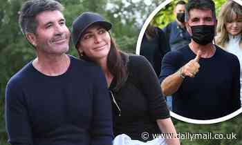 Simon Cowell appears to be in great spirits on 10km charity walk in London with Lauren Silverman