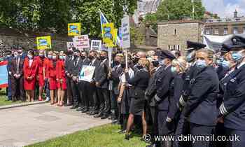 Let us fly again! Furious pilots and cabin crews march on Westminster