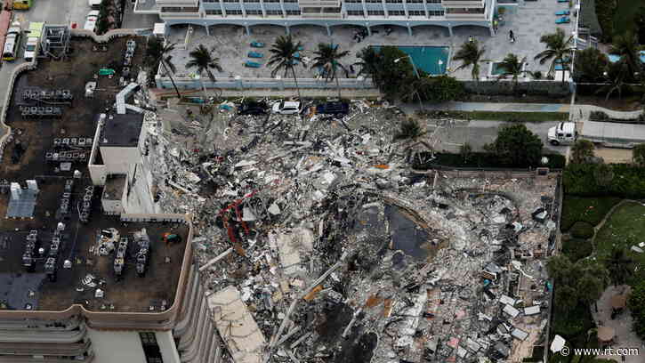 Building collapse in Miami feared to have killed dozens as search stretches on over 12 hours with no new rescues, 99 still missing