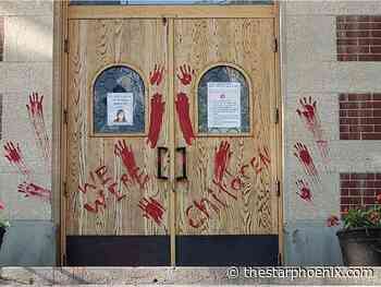 'We were children': Catholic cathedral doors, nuns statue painted red for unmarked graves