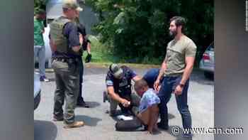 An investigation is underway into the arrest of two US siblings that was caught on video