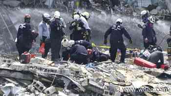 Families hold onto hope as condo collapse toll rises to 9