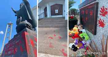 Pope John Paul II statue vandalized with red paint at Edmonton church
