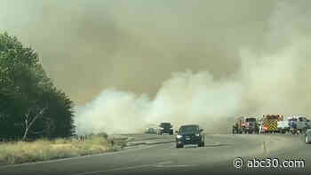 Roads shut down as Fresno County crews battle 200-acre fire near Friant and Willow