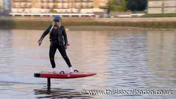 Olympian rides down the River Thames on 'flying surfboard'