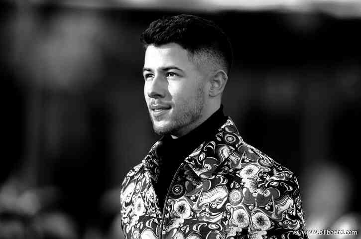 Nick Jonas Surprises a Fan on the Street & Her Reaction Is Priceless: Watch