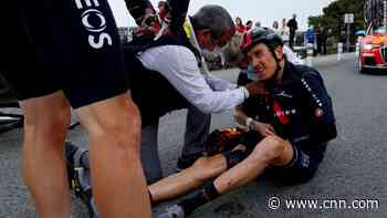 Former Tour de France winner rides on after dislocated shoulder put back in place