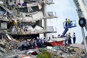 Crews spend 5th day atop shaky pile of collapsed concrete