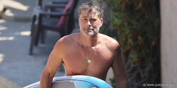 Shirtless Rob Lowe Goes Paddleboarding In The Ocean